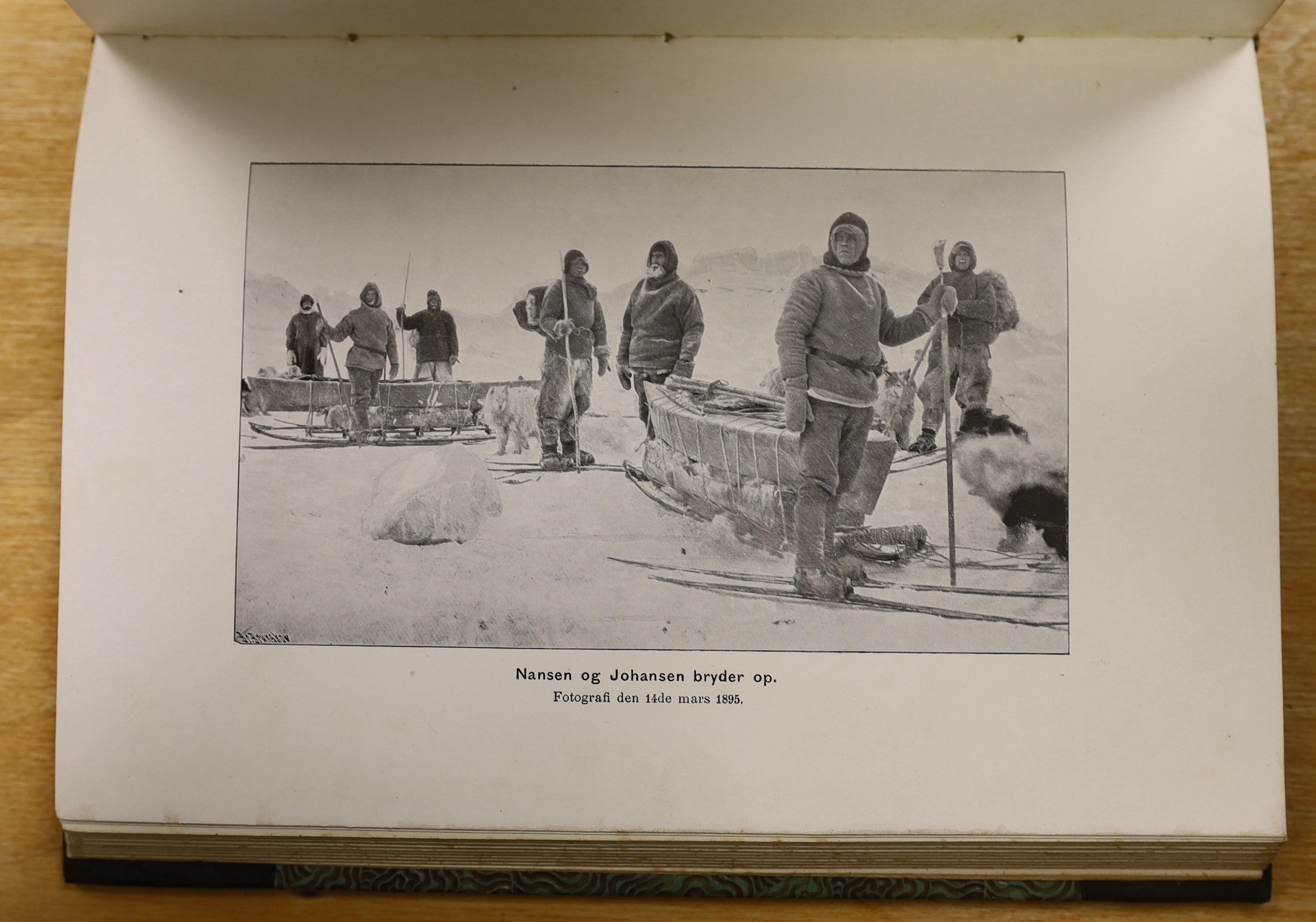 Nansen, Fridtjof - Fram over Polhavet: den Norske Polarfaerd 1893-1896. 2 vols. photogravure portrait, 42 plates (3 coloured and folded) and 3 coloured and folded maps; contemp. half morocco and cloth, patterned e/ps. Kr